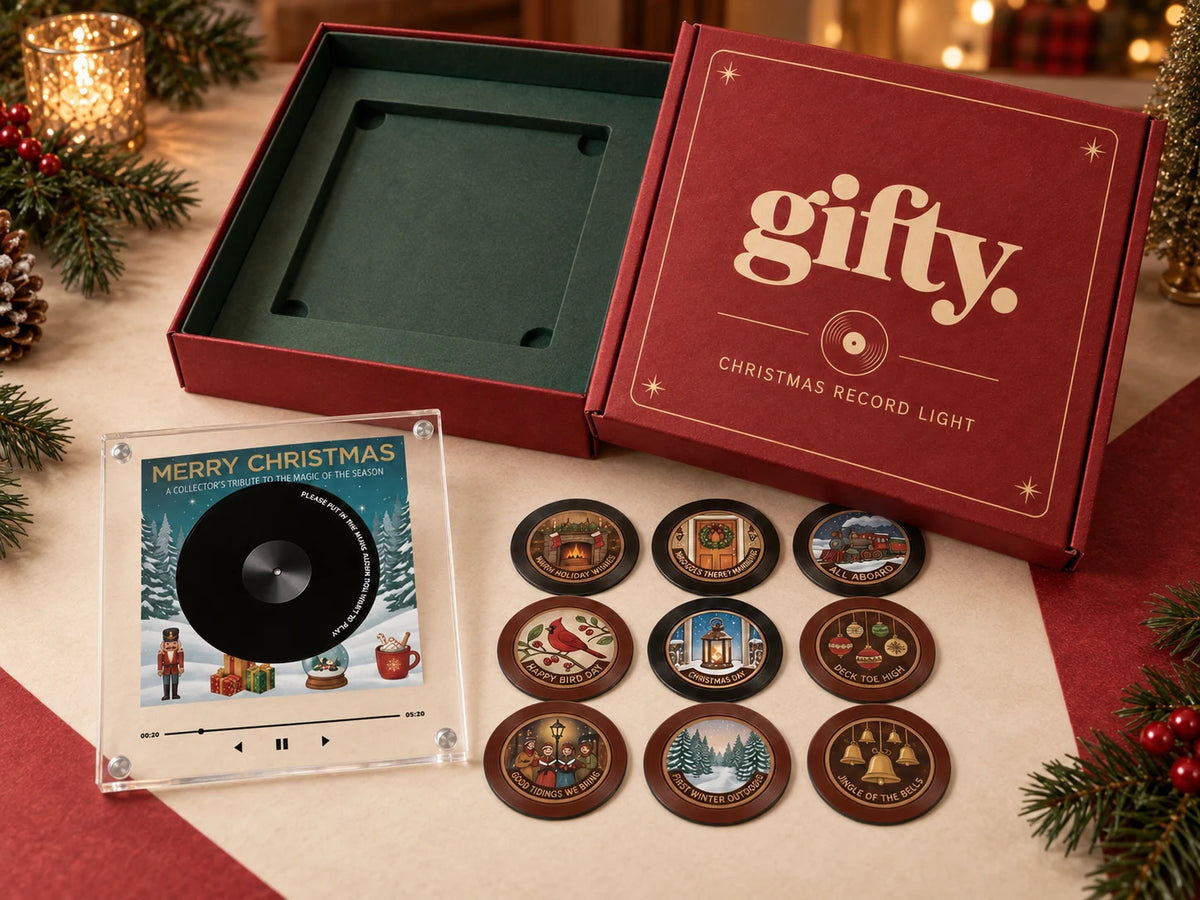Gifty Christmas box with one acrylic Christmas Record Light plaque and nine illustrated discs