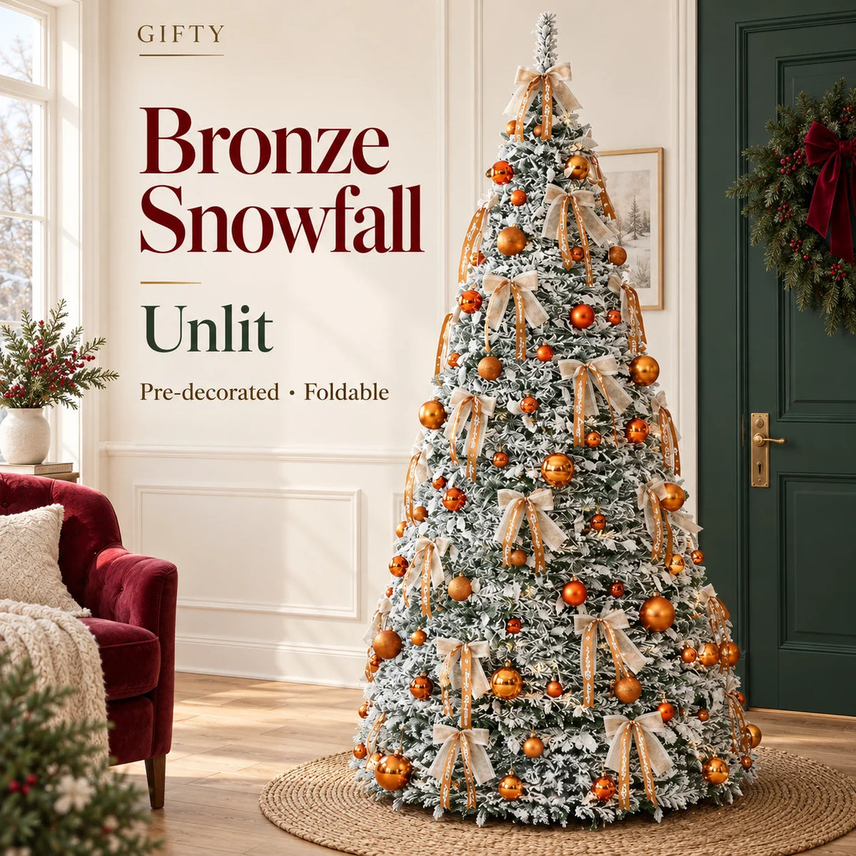 Bronze Snowfall unlit foldable tree with snow-flocked branches, copper ornaments and ribbon bows.