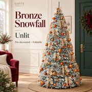 Bronze Snowfall unlit foldable tree with snow-flocked branches, copper ornaments and ribbon bows.