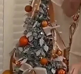 Bronze Snowfall round metallic-tone ornaments, close-up from the product demonstration