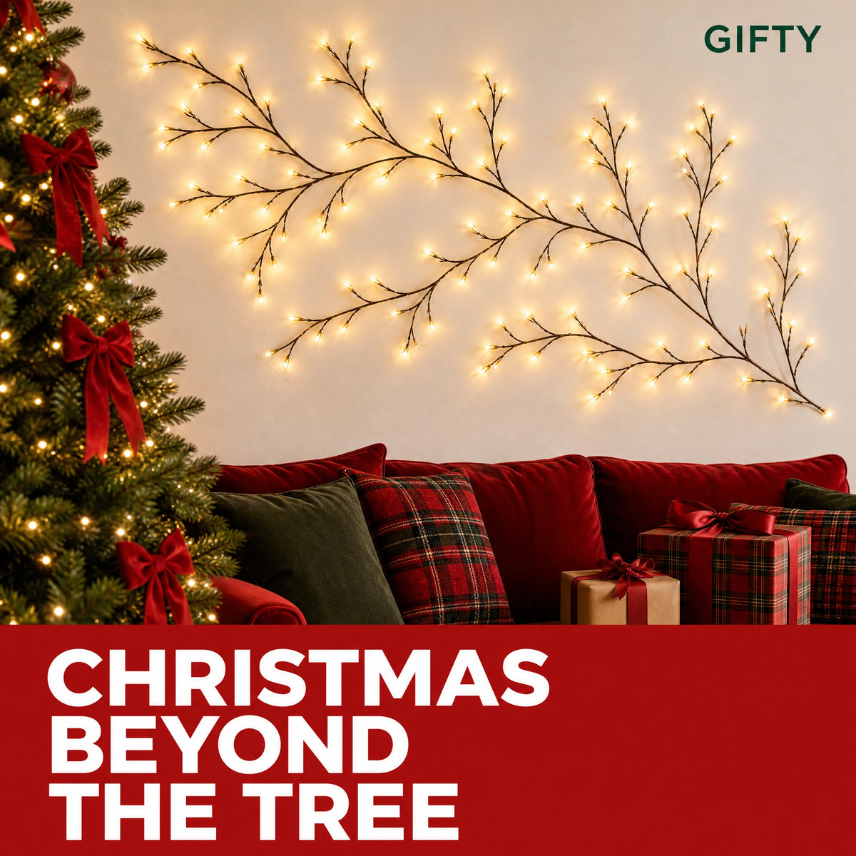 Gifty bare warm-white Christmas vine lights sweeping above a red sofa